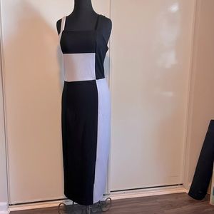 Rachel black and white dress. Medium. Mod chic. Sleeveless. Midi. Slit. Zip up.